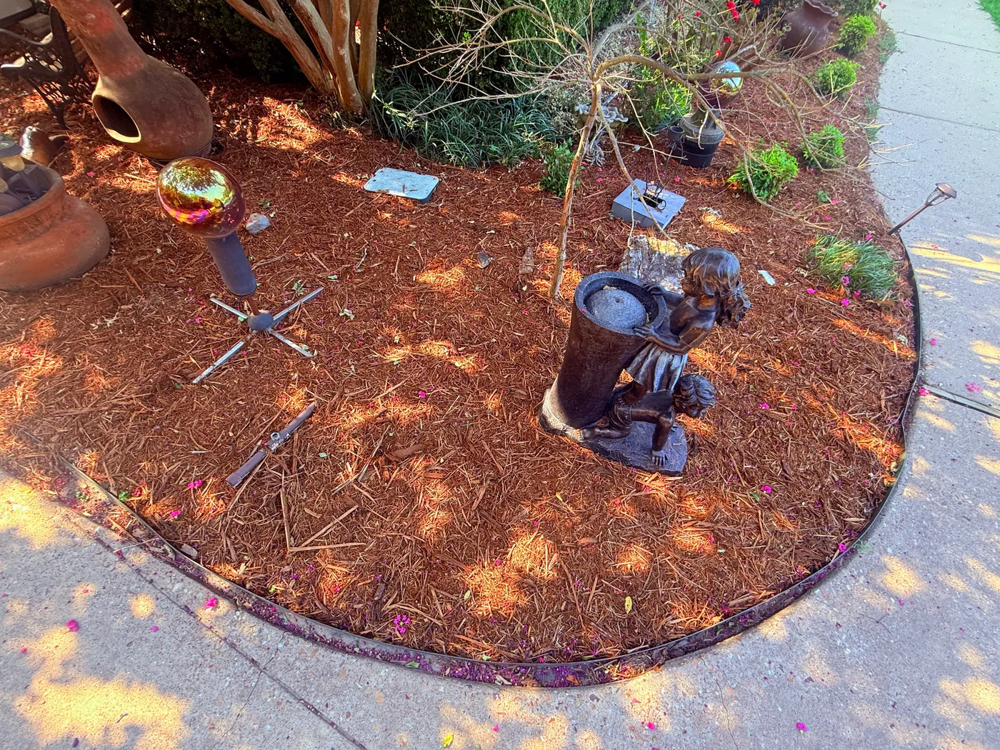Freshly mulched flower bed with clean edging