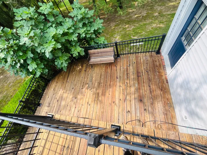 Clean deck with bench after pressure washing